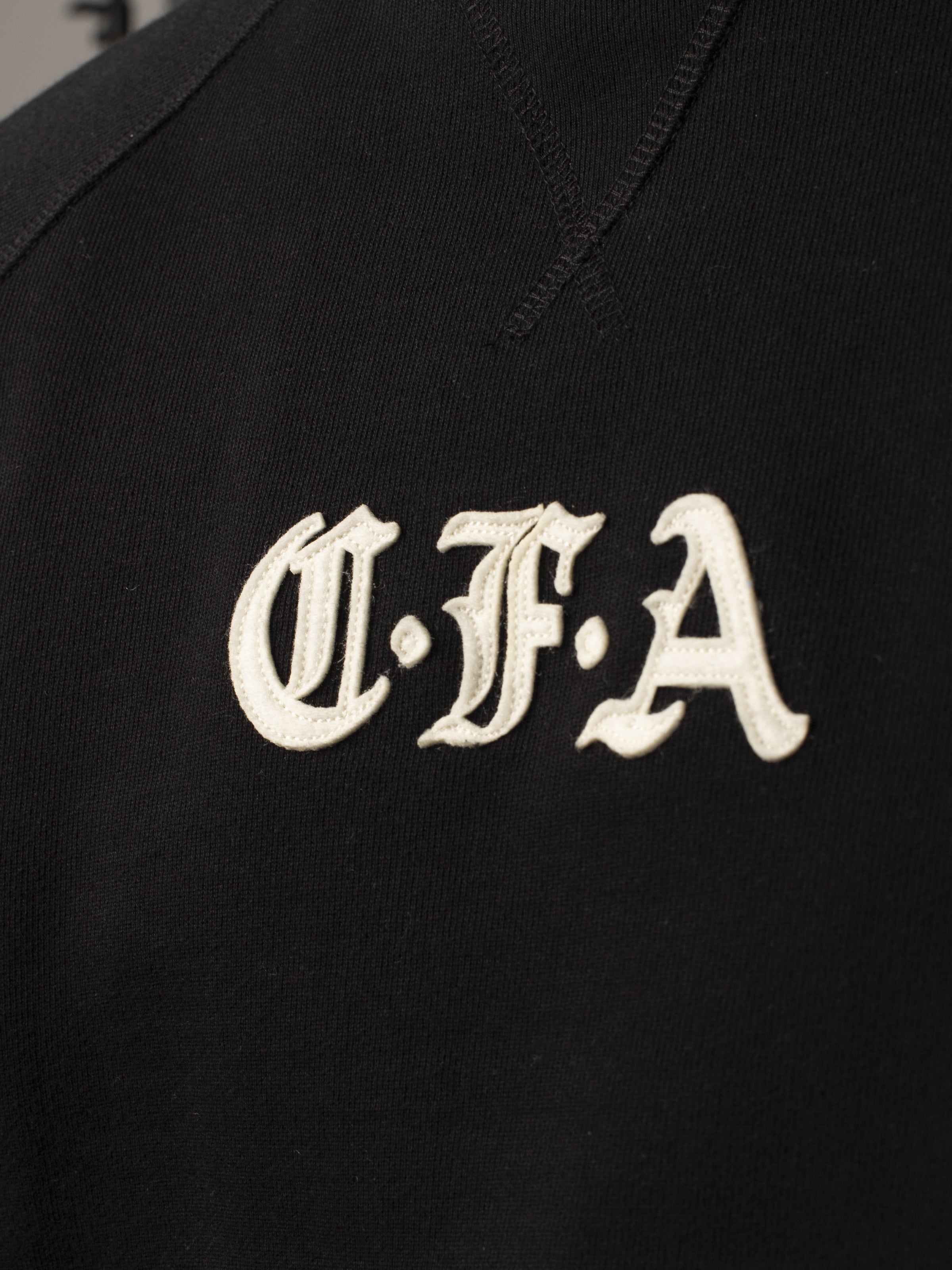 CFA Appliqué Raglan Sweatshirt in Black
